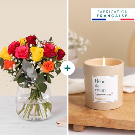 Multicolored roses and candle