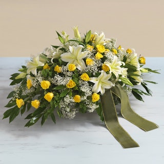 Cojín funerario amarillo